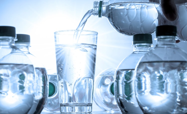bottle-pouring-water-glass